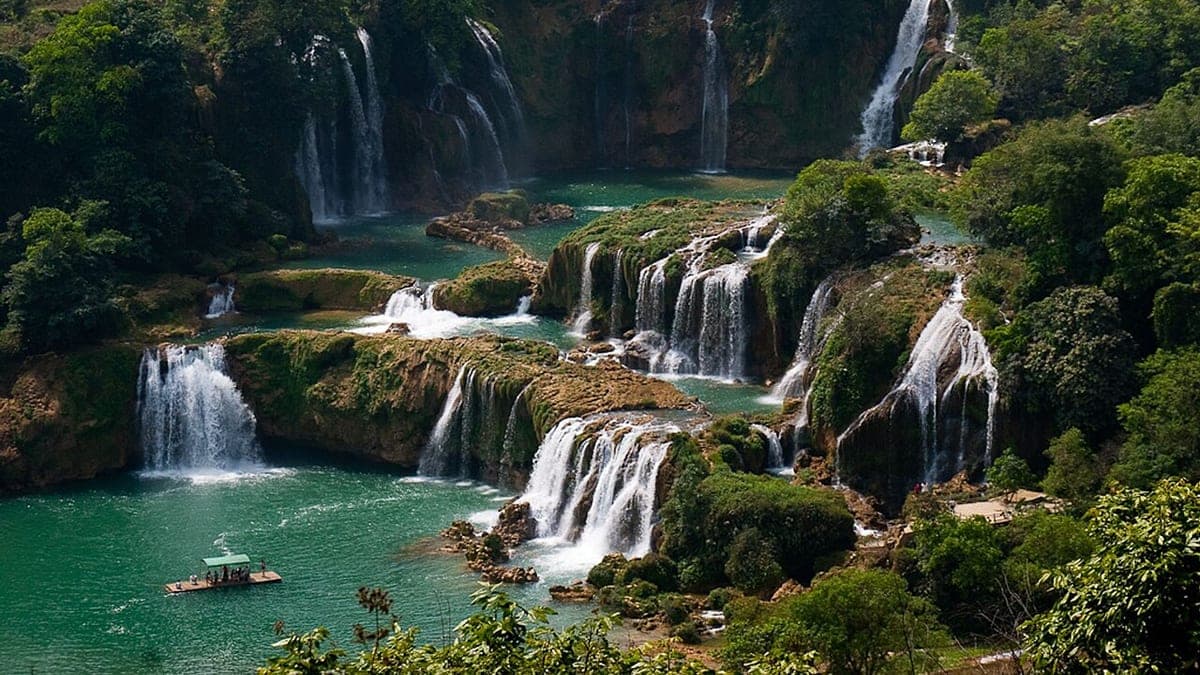 Ban Gioc Waterfall beside rice fields in Cao Bang province
